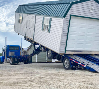 Shed installation on a strong foundation, featuring comprehensive site preparation for long-lasting outdoor storage solutions.